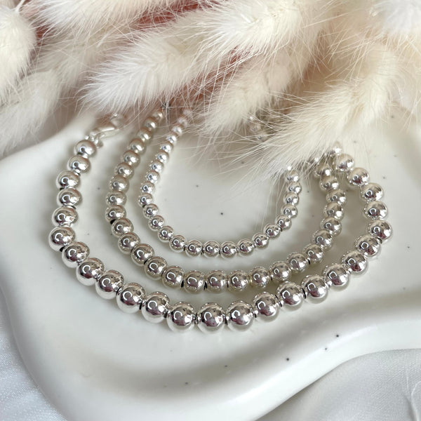 B069 Bracciale con palline piccole - medie - grandi