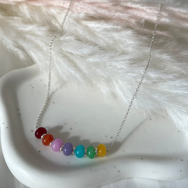 CL0164 Collana candy con maglia roló e rondelle arcobaleno e argento centrali