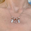 CL078 Family Necklace with Family First Pendants and Central Pink Zirconia Heart