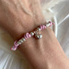 B0270 Bracciale in cordino cerato con granelli e cuore pendente