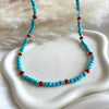 CL0180 Collana con cubetti di aulite sfaccettata, corallo e rondelle argento.