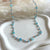 CL0178 Collana rosario rosata con perline verde acqua