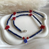 CL0179 Collana con cubetti di lapislazzuli sfaccettato, corallo e occhio turco portafortuna pendente