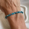 B0287 Bracciale con cubetti in apatite sfaccettata e rondelle argento
