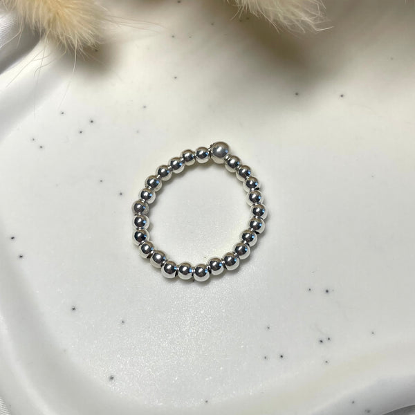 A014 Anello elasticizzato con palline piccole