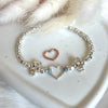 B153 Bracciale Family con pepite martellate e cuore vuoto