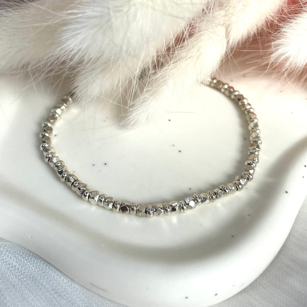 B019 Bracciale borchie piccole e anelline