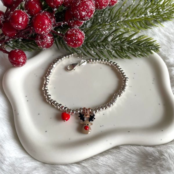 B0209 Bracciale cubotti con stellina e renna