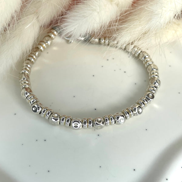 B081 Bracciale con pepite medie martellate alternate a 2 rondelle