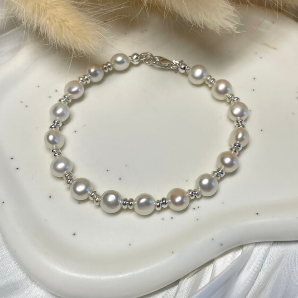 B0193 Bracciale argento rondelle mini e perle di fiume a sassolino