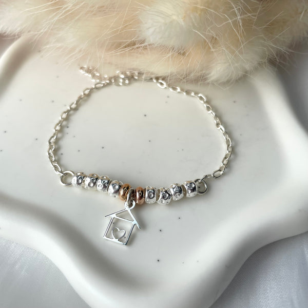 B158 Bracciale con granelli centrali e ciondoli a scelta (non inclusi nel prezzo)