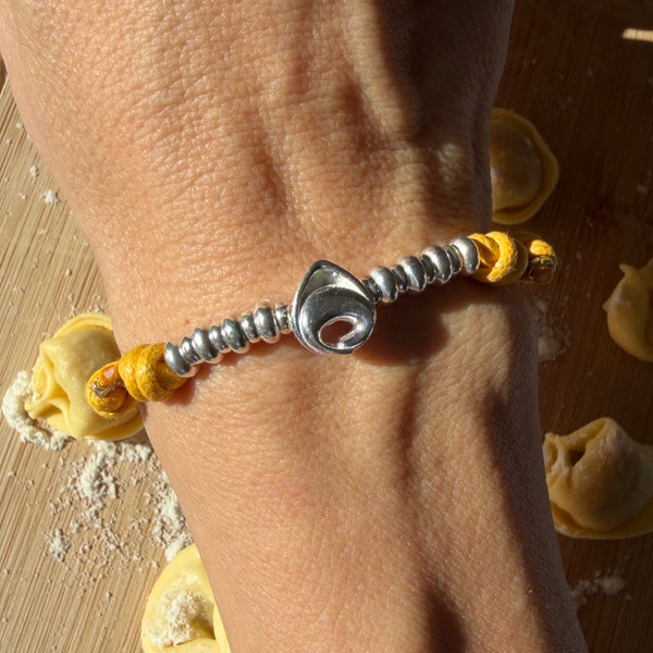 B0205 Bracciale con Cordino Cerato rondelle e passante Tortellino