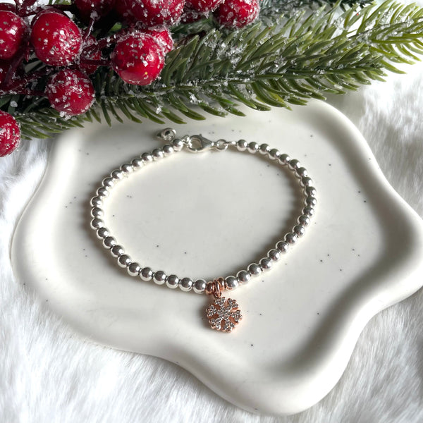 B0208 Bracciale con palline argento e fiocco di neve rosato