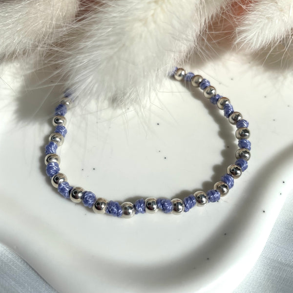 B082 Bracciale con palline piccole alternate a nodini in filo nautico