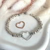 B046 Bracciale con pepite martellate medie e nodini argento + cuore vuoto grande centrale