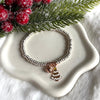 B0211 Bracciale rondelle con albero di natale e campanella