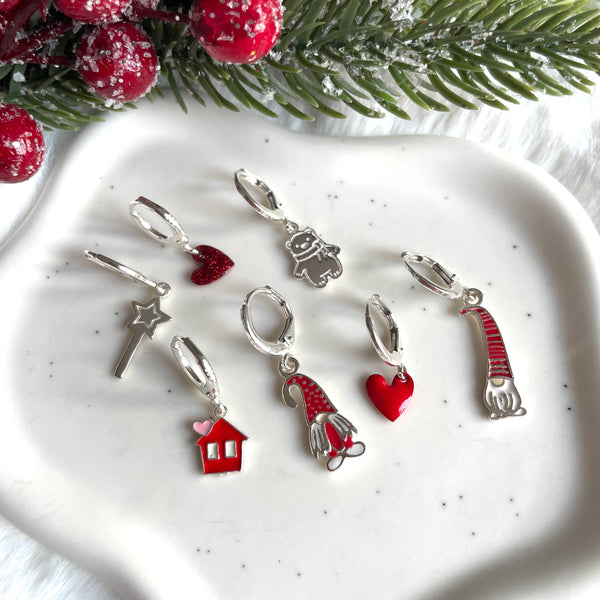O007 Mono orecchini anelle con simboli Natale
