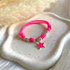 B0296 Bracciale paracord rosa fluo con stella marina smaltata abbinata