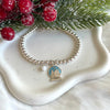 B0226 Bracciale palline con ciondolo palla di neve