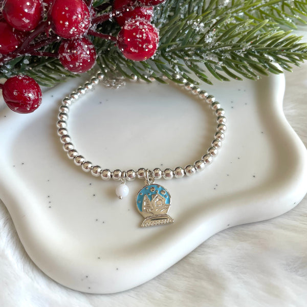 B0226 Bracciale palline con ciondolo palla di neve