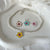 B0255 Bracciale argento con palline sfaccettate e fiore smaltato