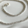 CL0102 Collana in argento con palline disco