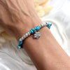 B119 Bracciale con 4 nodi di cordino cerato, 10 granelli nuovi, + ciondolo a scelta (a parte)