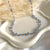CL056 Rosary necklace with pendant house with zircons