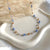 CL050 Rosary necklace with elongated pendant heart with zirconia