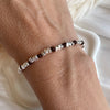 B0305 Bracciale con rondelle irregolari martellate piccole martellate e nodi in filo nautico