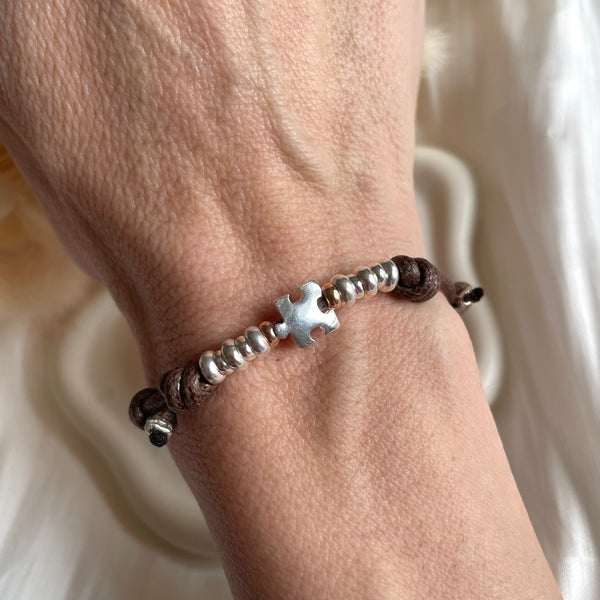 B0244 Bracciale in cordino cerato con puzzle e rondelle