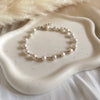 B0171 Bracciale rosario argento con perle di fiume tonde.