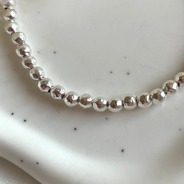 B0259 Bracciale palline martellate da 4mm
