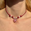 CL0157 Collana con cordino cerato granelli nuovi e cuore in vetro di murano rosso