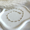 CV014 Cavigliera con catena palline piccole alternate a palline grandi