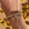 B131 Bracelet with nuggets, washers and pendant Tortellino pendant