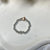 A015 Anello elasticizzato con palline e cuore argentato o rosato