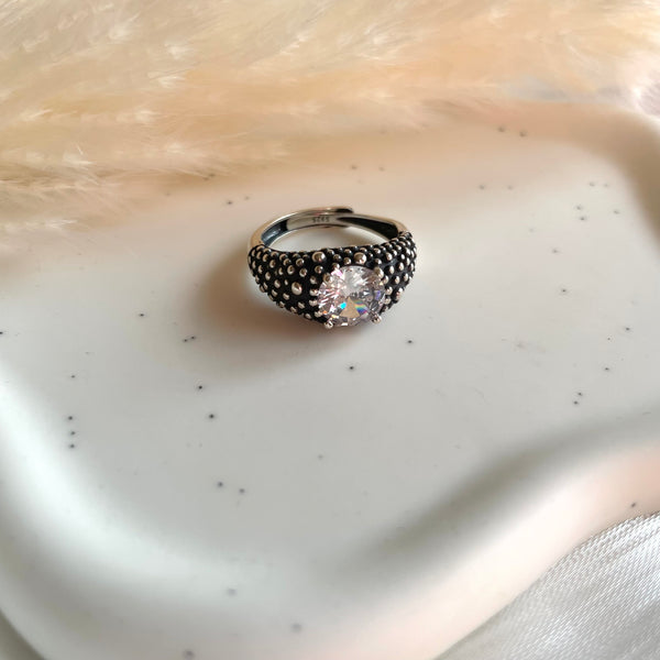 A008 Anello puntinato regolabile argento con zircone