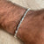 B026 Bracciale cilindri e nodi argento