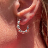O010 Ring earrings with pink nuggets and washers