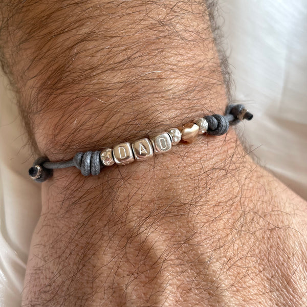 B143 DAD bracelet waxed cord and new grains + pink heart loop