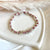 B0275 Bracciale filo nautico con pepite martellate e parola MOM