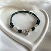 B0249 Bracciale cordino cerato e rondelle con elementi passanti bimbi e volendo iniziali