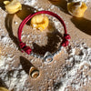 B109 Bracciale con Cordino Cerato e passante Tortellino