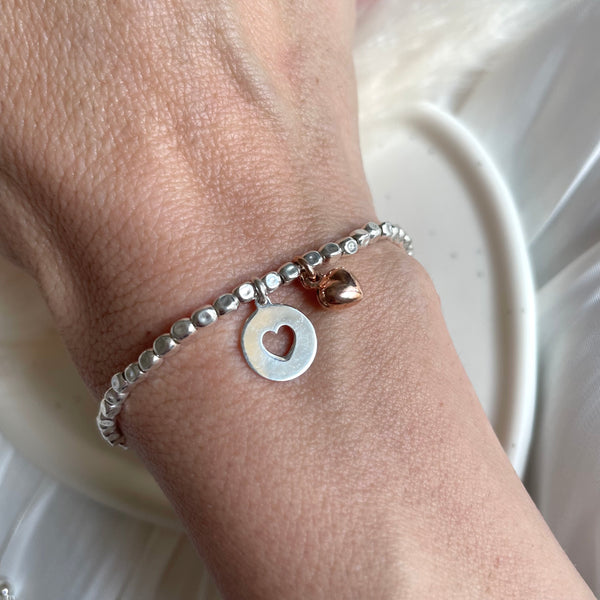B0268 Bracciale con pepite mini, ciondoli cerchio sagoma cuore e cuore rosato bombato