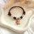 B105 Bracciale orsetto Bubi con Cordino Cerato e granelli