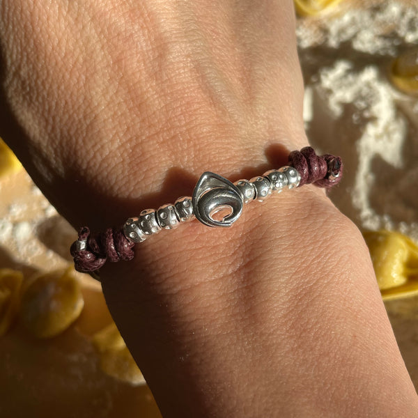 B109 Bracelet with Waxed Cord and Tortellino Pendant