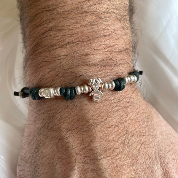 B0249 Bracciale cordino cerato e rondelle con elementi passanti bimbi e volendo iniziali