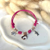 B036 Bracciale con 4 nodi di cordino cerato, 8 granelli nuovi, 2 rondelle rosate + ciondolo a scelta (a parte)