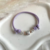 B0277 Bracciale in cordino cerato con granelli e fiore “grazie maestra” passante